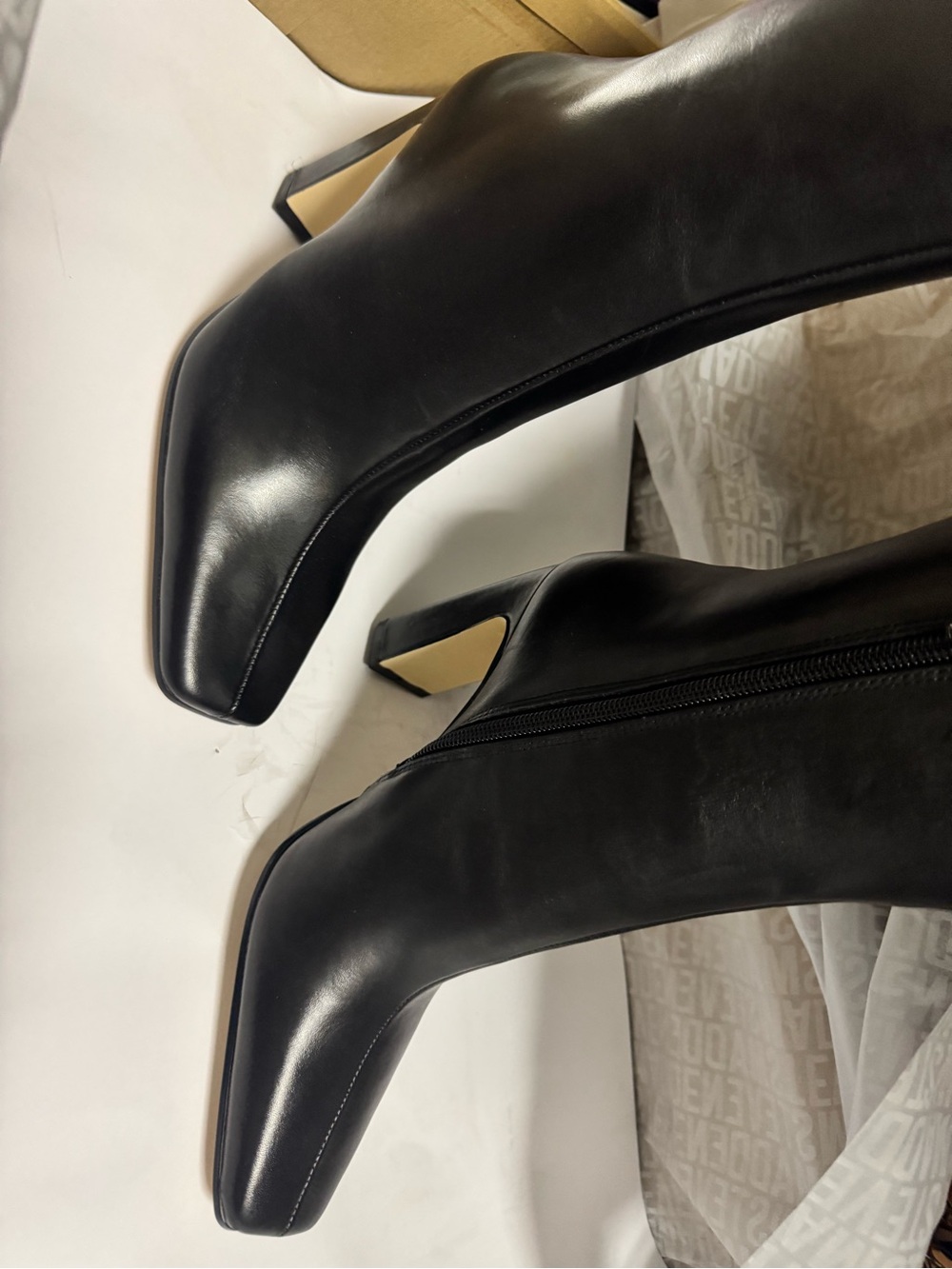 Steve Madden Knee high sleek square toe boot.